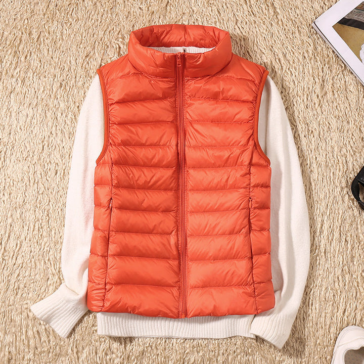 Amira™ | Chaleco ligero de plumas con diseño plisado